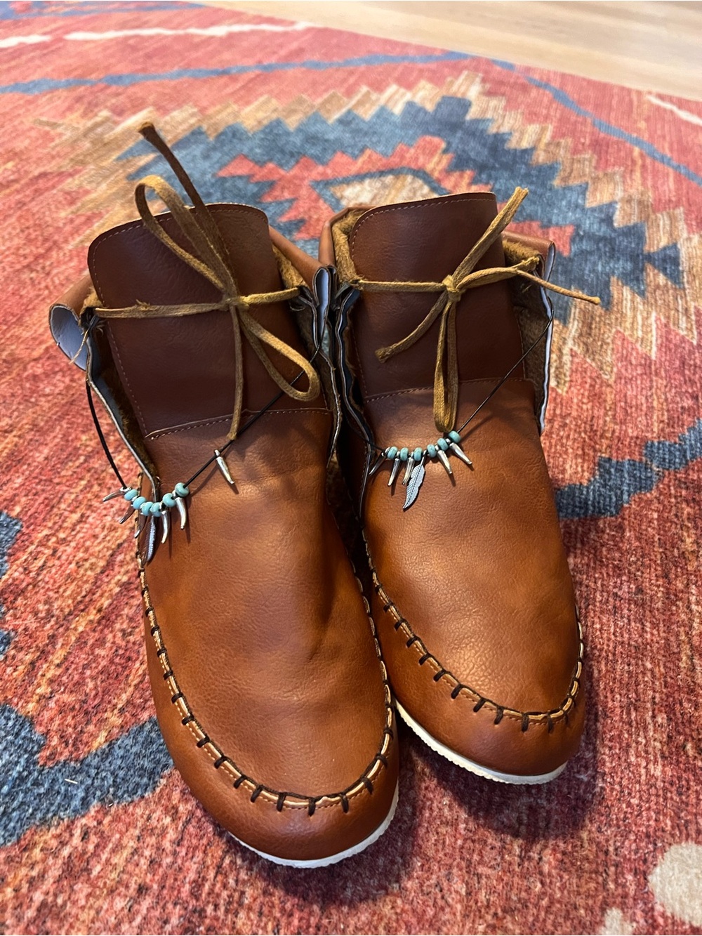 Women’s Brown Leather Moccasin Boots with Beaded Accent